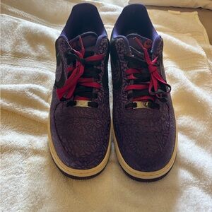 Nike Men's Purple Athletic Shoes with Red Accents